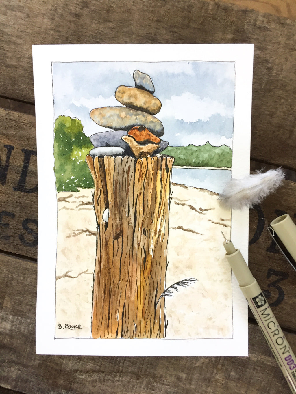 Cairn with feather