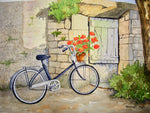 Bicycle and geraniums